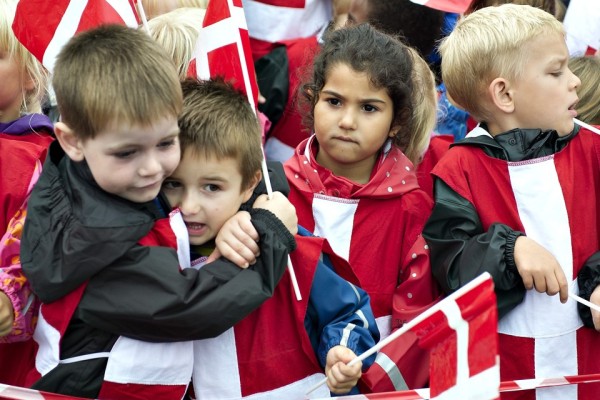 Children holding Danish flags watch as Denmark's Crown Prince Frederik (not pictured) attends a sailing match race at the Nations Cup in Middelfart August 8, 2013. REUTERS/Henning Bagger/Scanpix Denmark (DENMARK - Tags: POLITICS ROYALS SPORT YACHTING ENTERTAINMENT) 



ATTENTION EDITORS - THIS IMAGE HAS BEEN SUPPLIED BY A THIRD PARTY. IT IS DISTRIBUTED, EXACTLY AS RECEIVED BY REUTERS, AS A SERVICE TO CLIENTS. DENMARK OUT. NO COMMERCIAL OR EDITORIAL SALES IN DENMARK. NO COMMERCIAL SALES - RTX12DSF